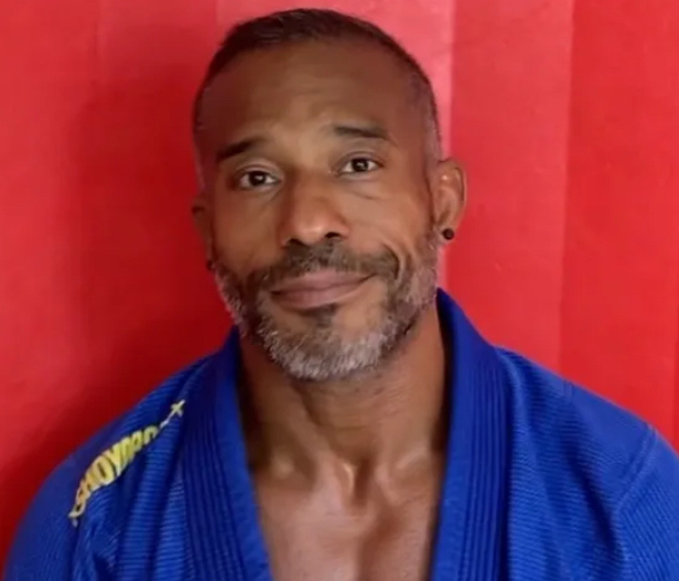 Julio Rivera in a blue jiu jitsu gi